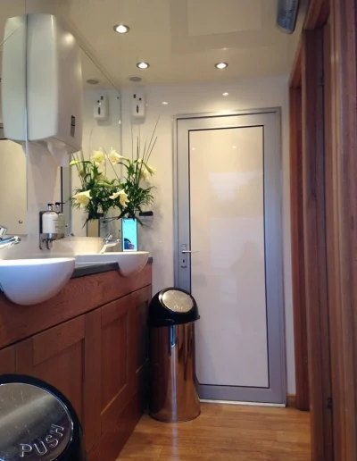 Large Deluxe White Mobile Toilet Hire