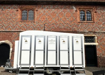 4 Bay Mobile Shower Units supplied by Mobile Thrones.